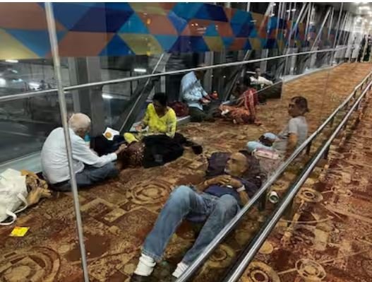 People claimed to have fainted without air conditioning after an Air India flight was delayed by 24 hours.
