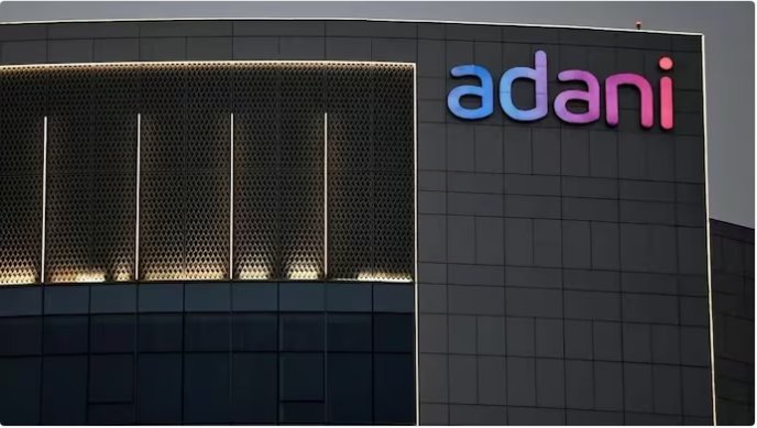 Adani shares rise to 18% as the group m-cap reaches pre-Hindenburg levels.