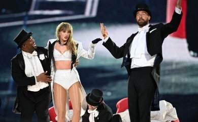 At Taylor Swift's concert, Travis Kelce, Tom Cruise, and other celebrities dance.
