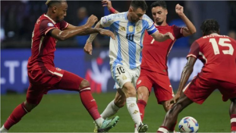 Argentina wins the Copa America match as Lionel Messi demonstrates his ability to work magic even on a "springboard of a pitch."