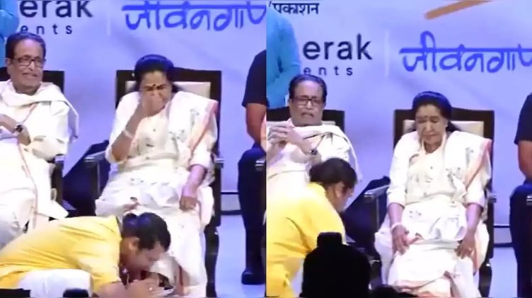 Sonu Nigam washes Asha Bhosle's feet; called "quintessentially Indian."